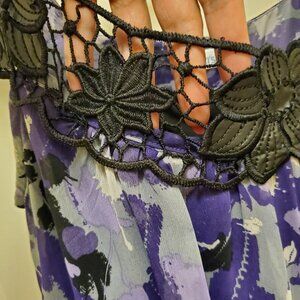 Purple and black sleeveless top with black lace/ faux leather trim peplum style